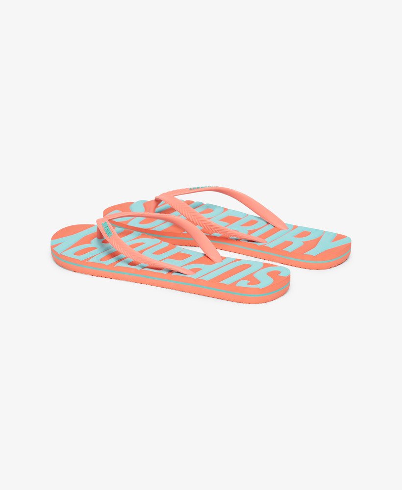chinelo de dedo vegano vintage na cor coral.