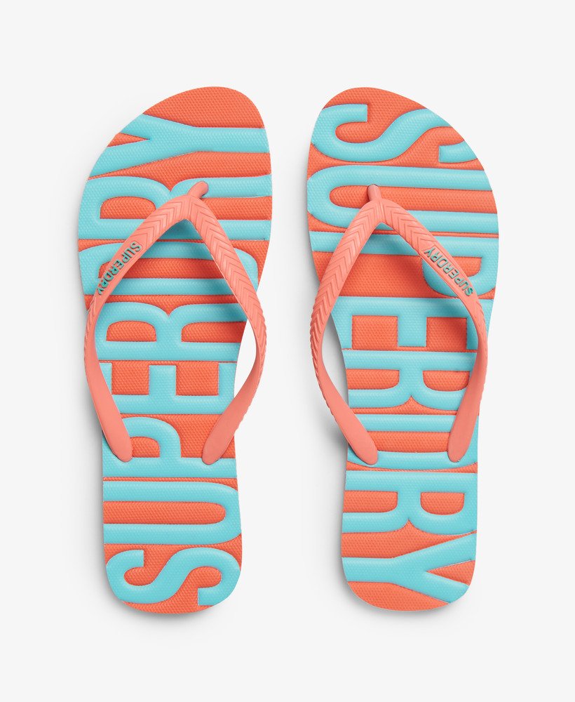 chinelo de dedo vegano vintage na cor coral.