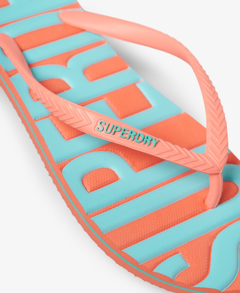 chinelo de dedo vegano vintage na cor coral.