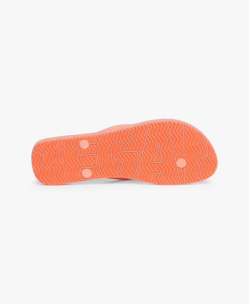 chinelo de dedo vegano vintage na cor coral.