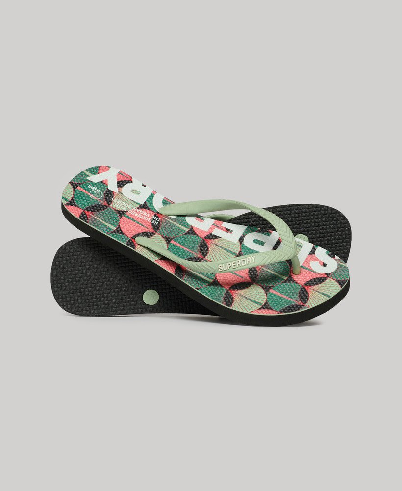 chinelo vegano com logo em estampa geométrica laranja.