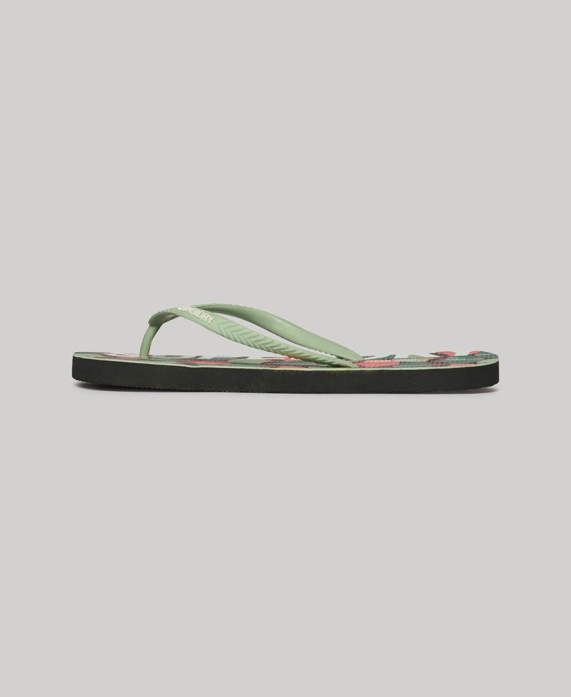 chinelo vegano com logo em estampa geométrica laranja.