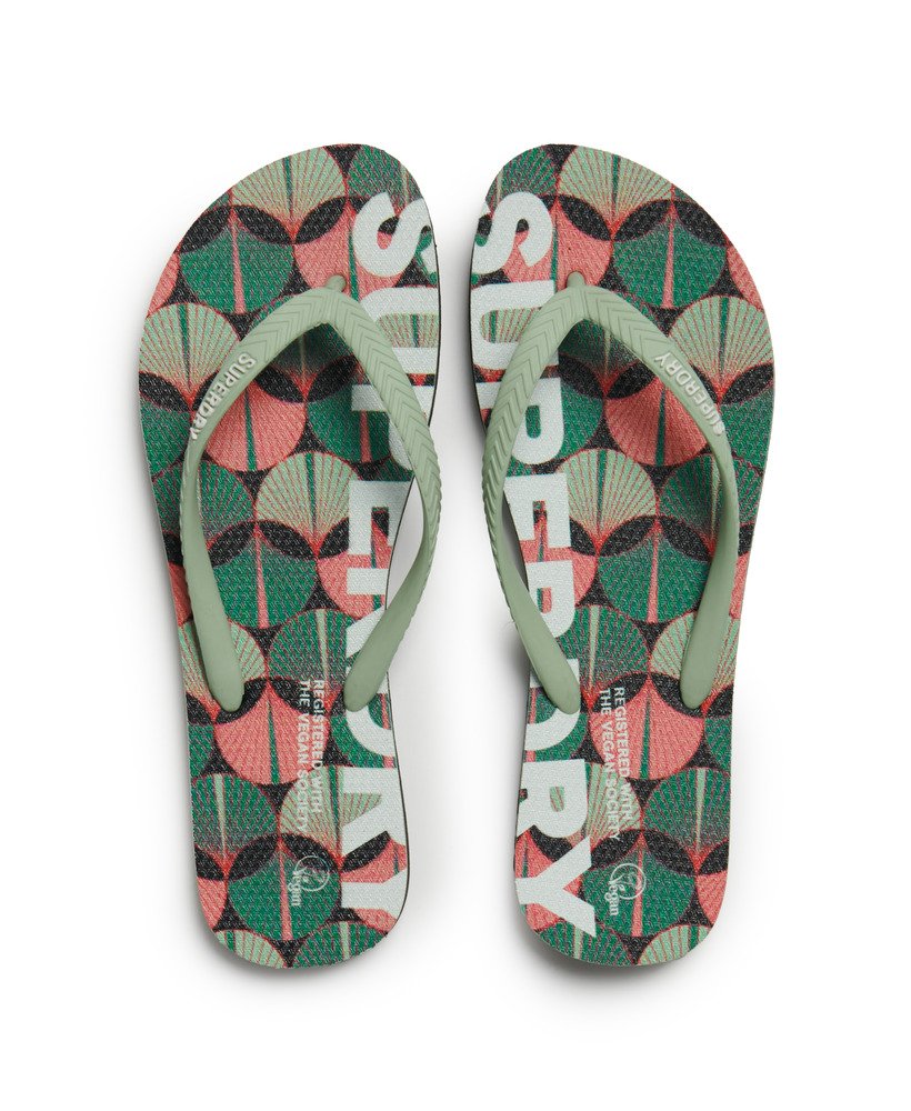 chinelo vegano com logo em estampa geométrica laranja.
