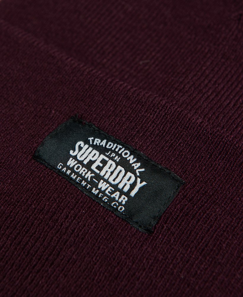 gorro clássico de tricô na cor mescla bordô.