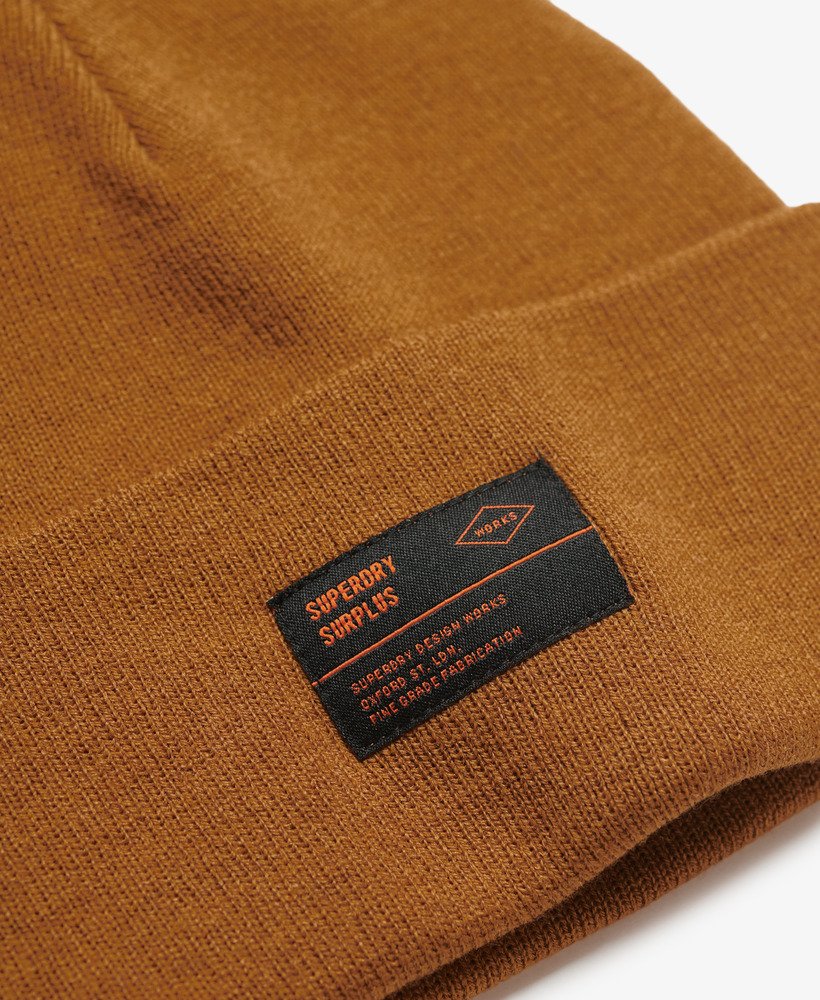 gorro de malha surplus na cor marrom tabaco da denim co.