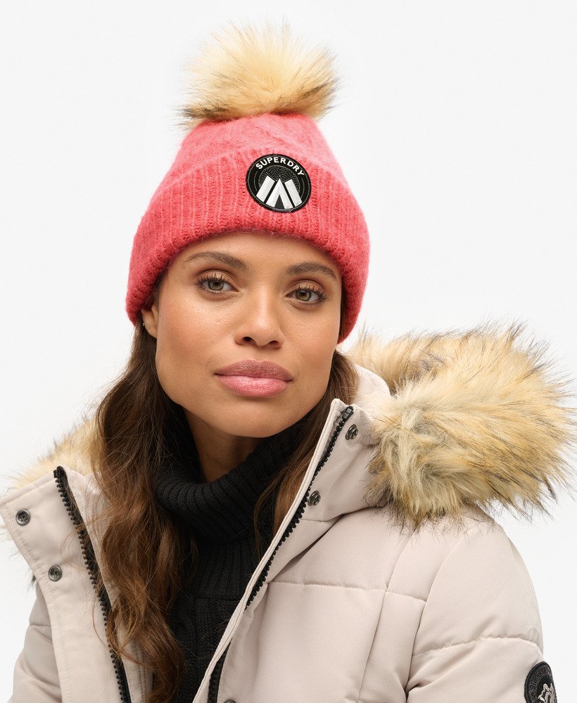 gorro de malha trançada cable luxe na cor rosa claro
