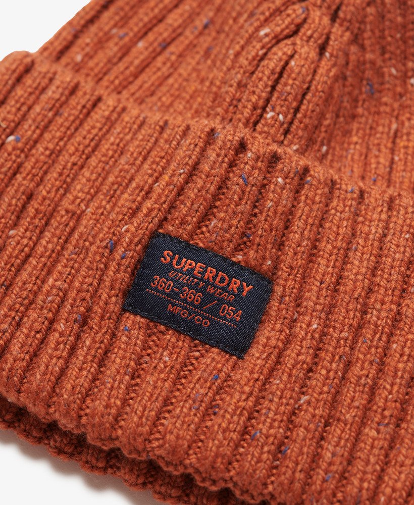 gorro de tricô nep da rkwear na cor laranja tijolo.