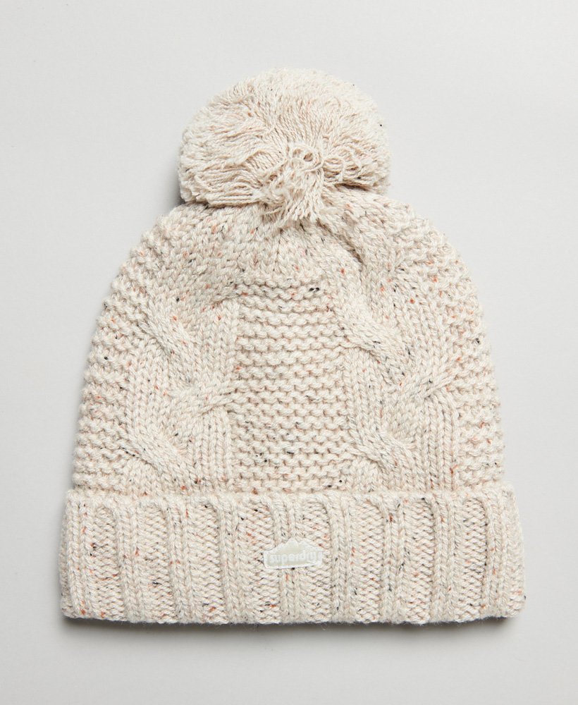 gorro de malha trançada com pompom em tweed cor aveia