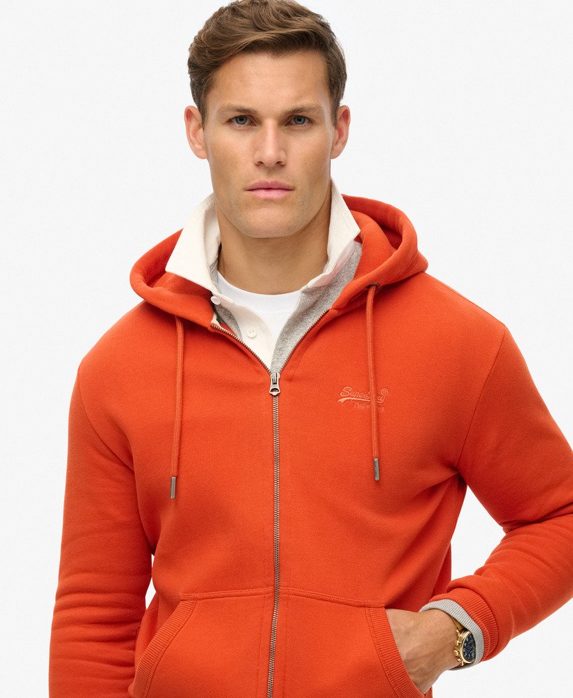 moletom com zíper e logo essencial da denim co na cor laranja ferrugem