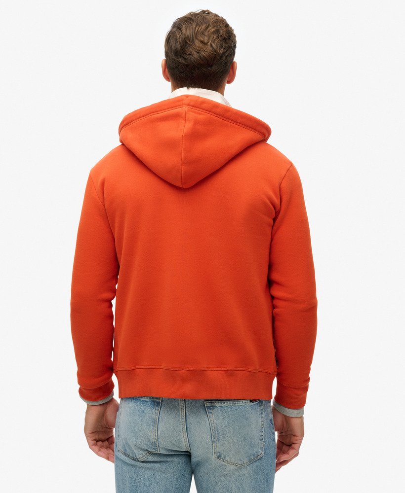 moletom com zíper e logo essencial da denim co na cor laranja ferrugem