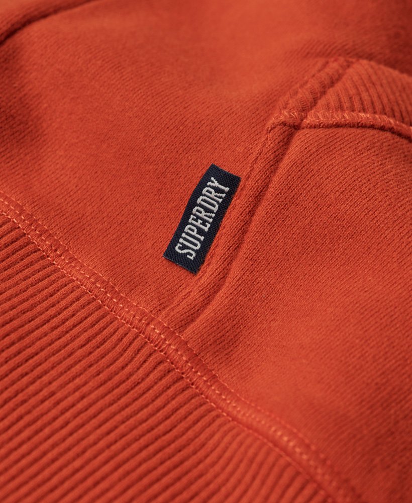 moletom com zíper e logo essencial da denim co na cor laranja ferrugem