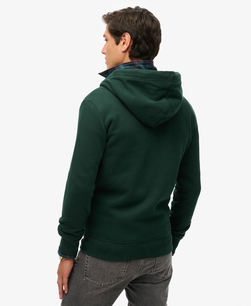 moletom com zíper e logo essencial na cor verde floresta
