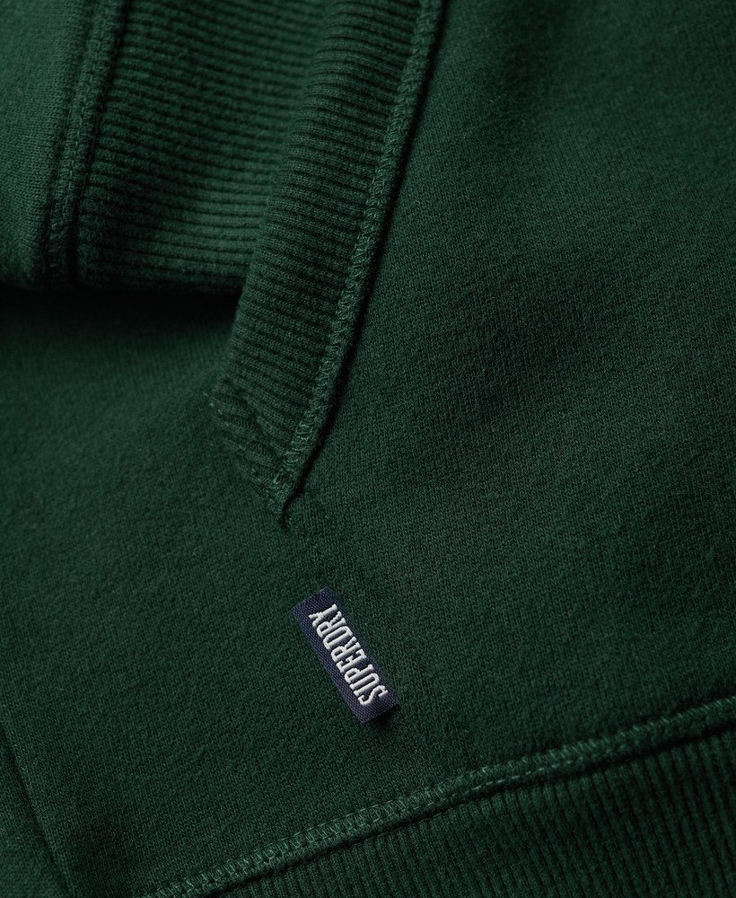 moletom com zíper e logo essencial na cor verde floresta