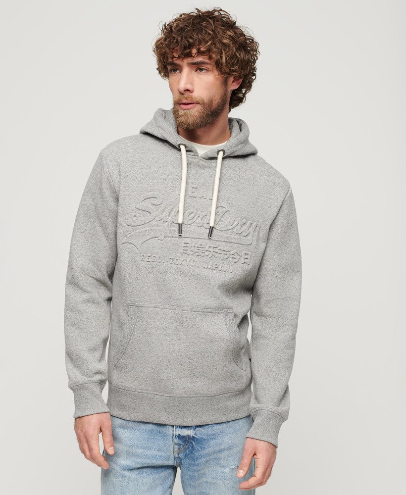 moletom com capuz e logo vintage em relevo na cor cinza claro true grit.