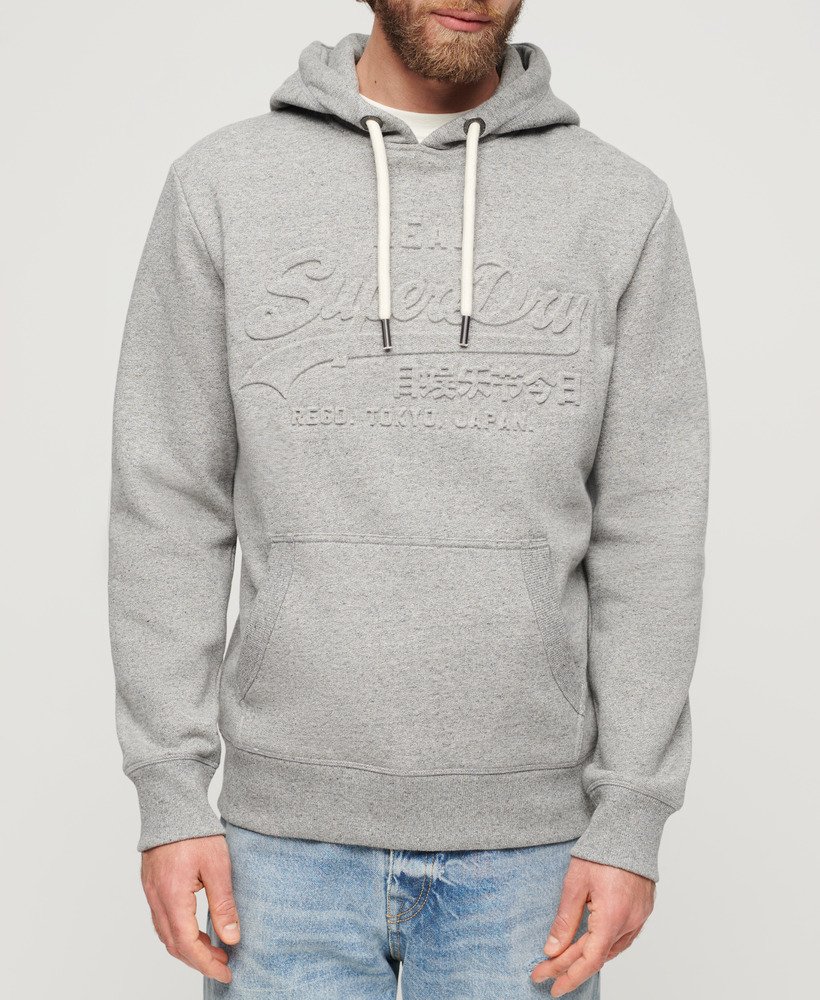 moletom com capuz e logo vintage em relevo na cor cinza claro true grit.