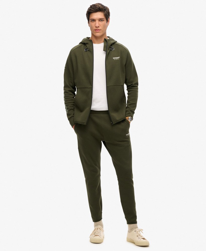 moletom com capuz e zíper sport tech logo loose na cor cáqui militar.