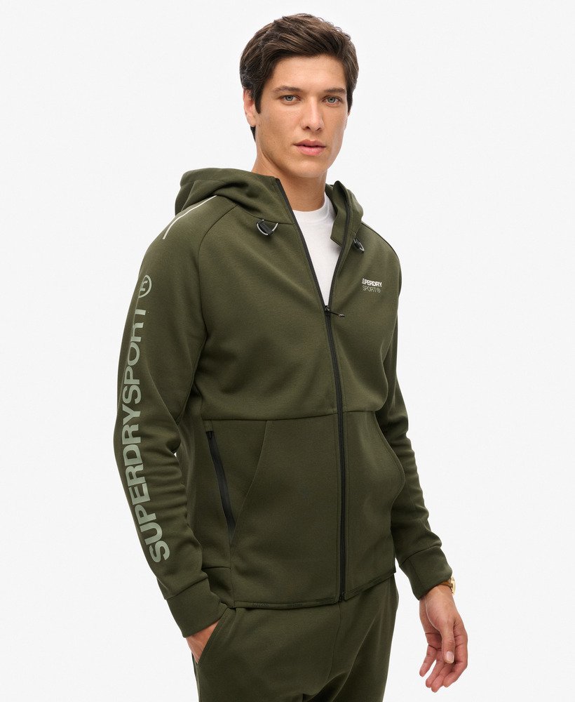 moletom com capuz e zíper sport tech logo loose na cor cáqui militar.