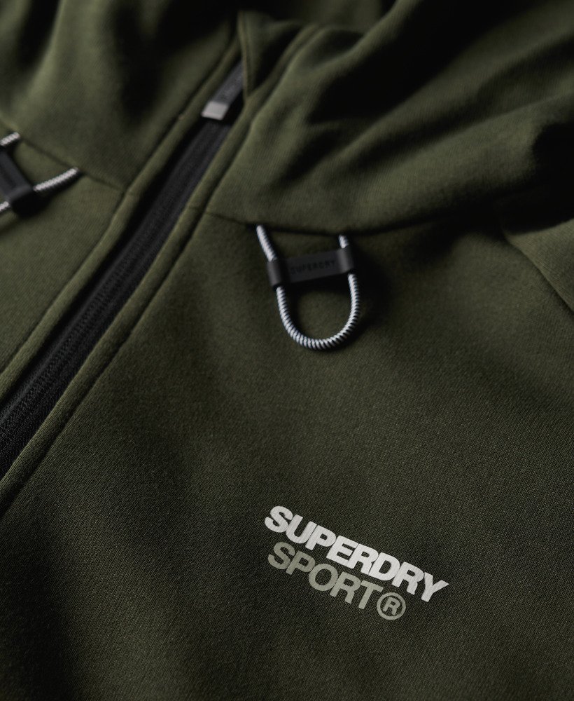 moletom com capuz e zíper sport tech logo loose na cor cáqui militar.