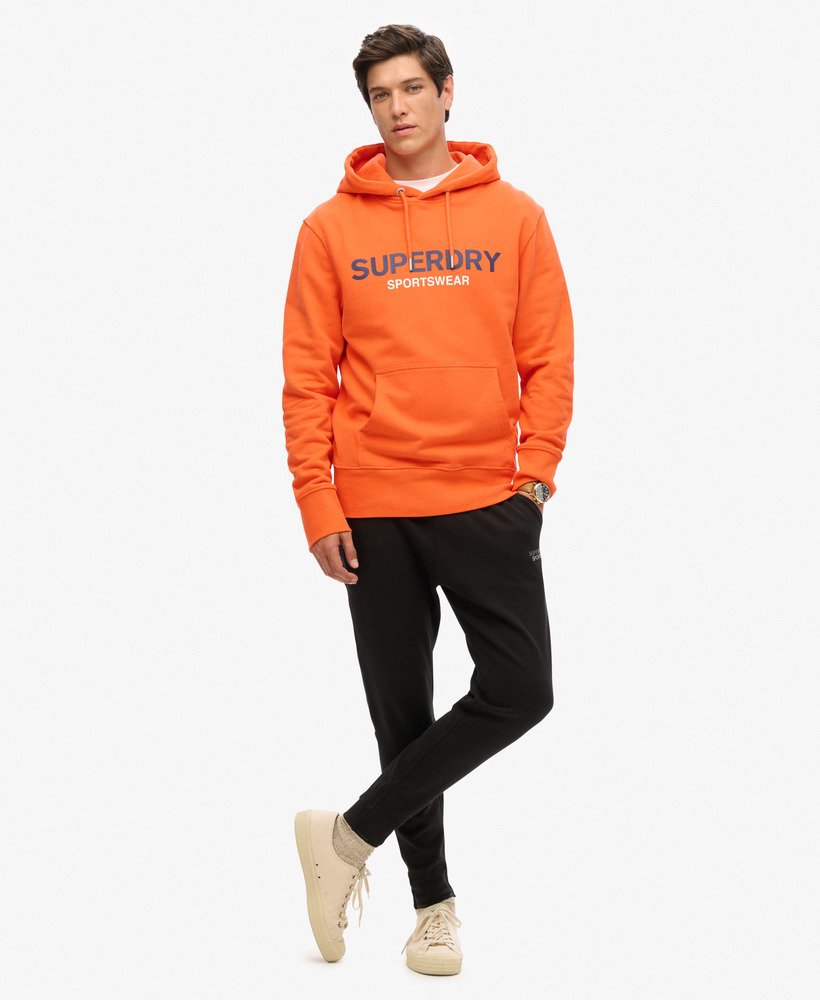 moletom com capuz folgado com logo da sportswear na cor laranja vibrante.