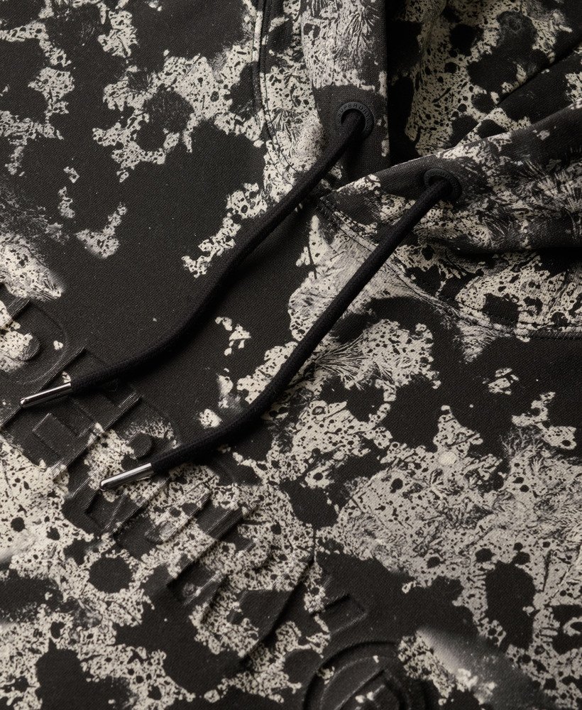 moletom folgado com capuz e estampa texturizada utility camo logo na cor preta.