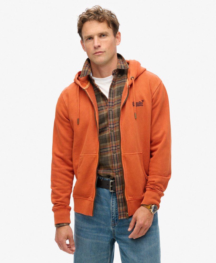moletom com zíper e logo essencial na cor marrom washed autumn glaze.