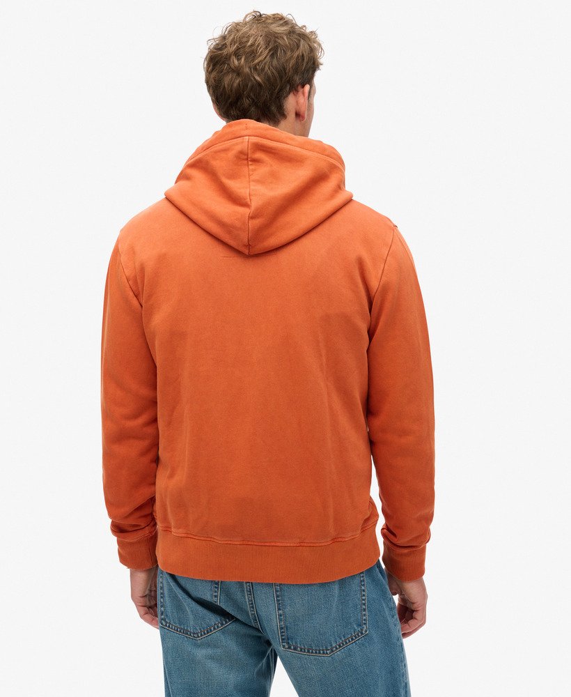 moletom com zíper e logo essencial na cor marrom washed autumn glaze.