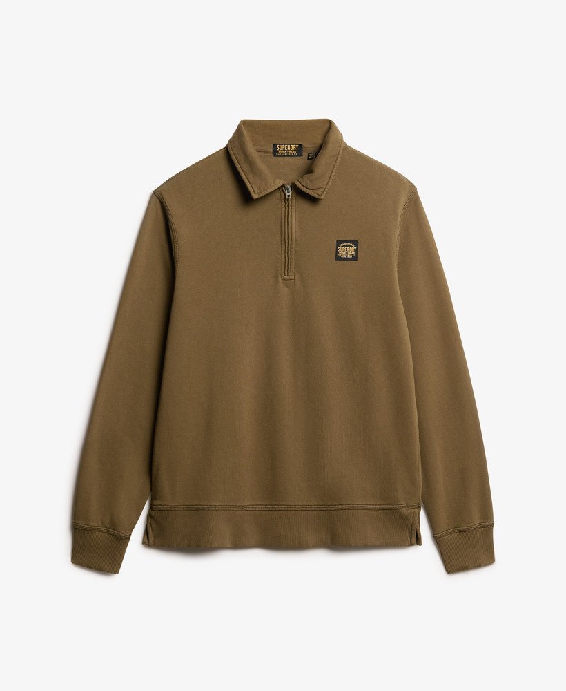 blusa com meio zíper e costura contrastante na cor verde-escura lavada.