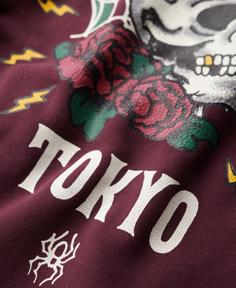 moletom folgado com capuz e estampa de tatuagem nas costas na cor roxo figo
