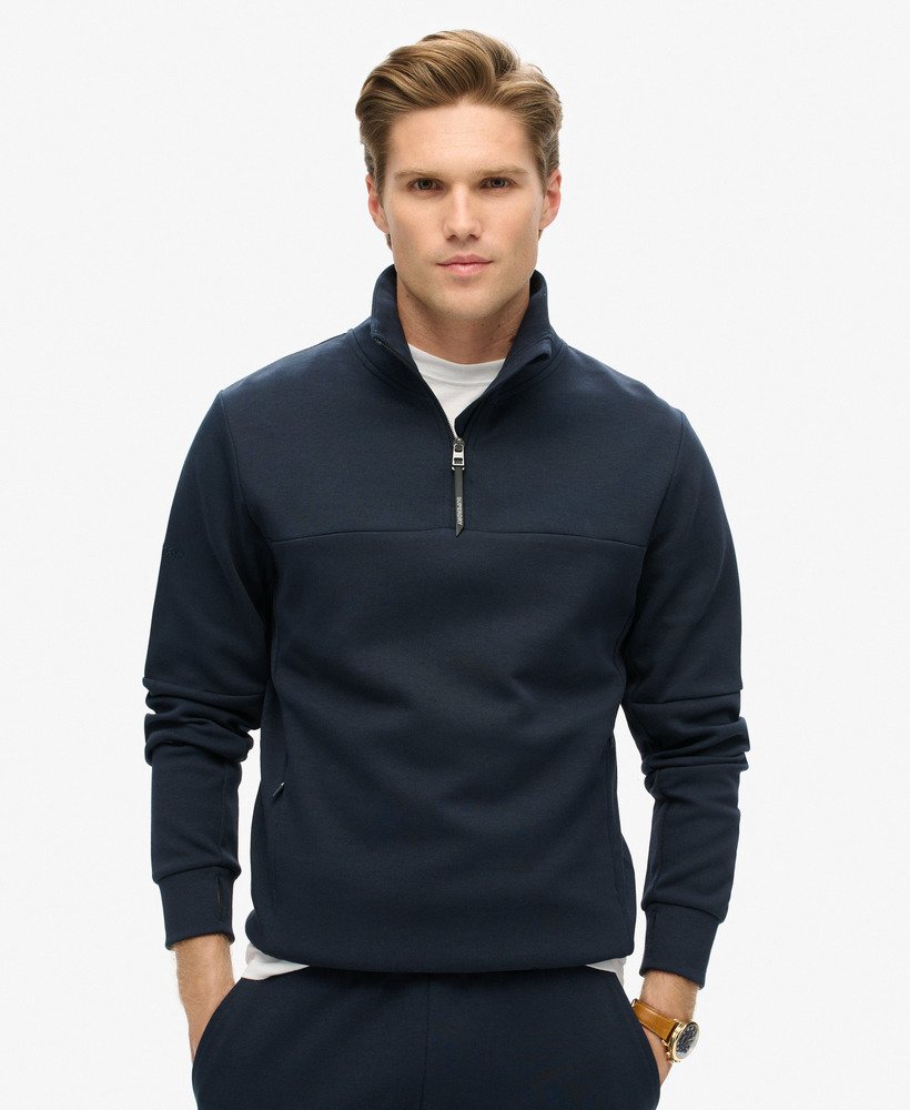 moletom tech loose com meio zíper na cor azul marinho escuro