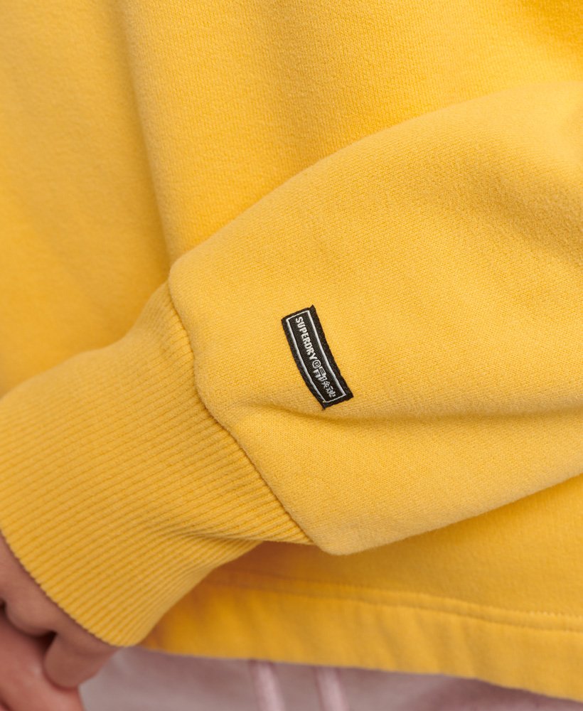 moletom com capuz e logo gráfico arco-íris em amarelo pigmentado