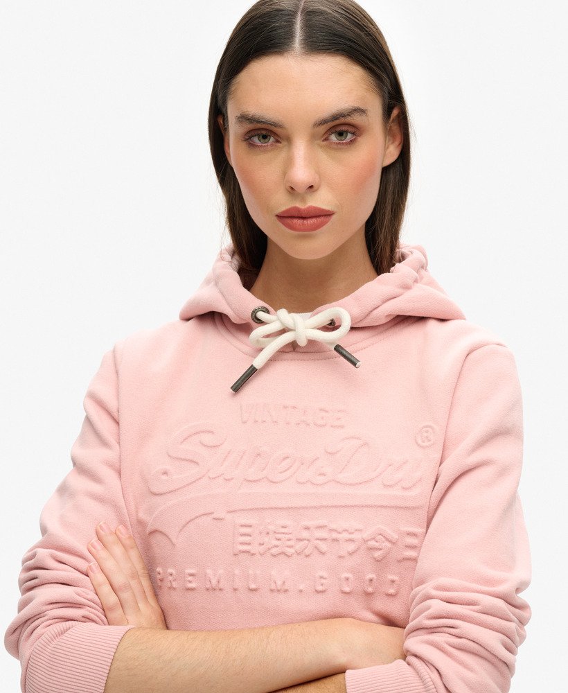 moletom com capuz e logo vintage em relevo na cor rosa blush vintage.