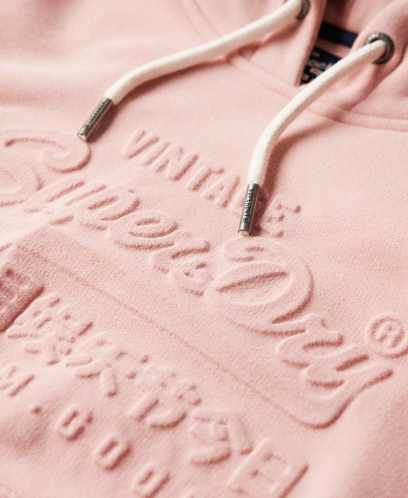 moletom com capuz e logo vintage em relevo na cor rosa blush vintage.