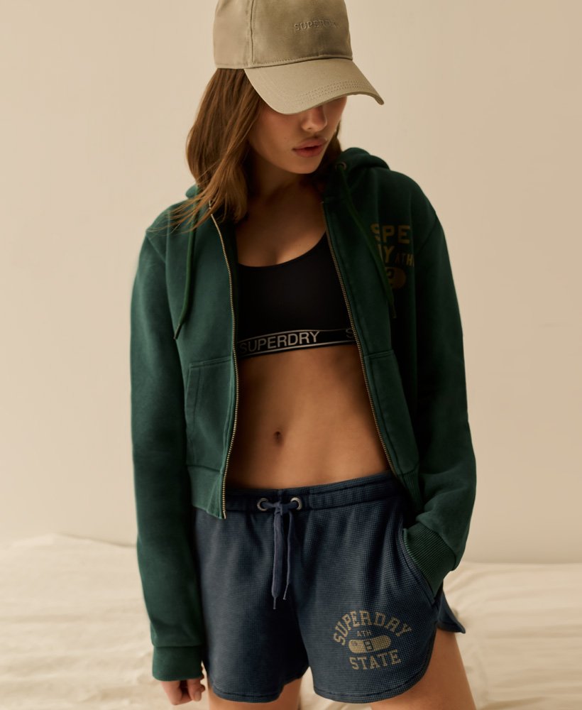 moletom cropped com zíper athletic essentials na cor verde pinho escuro