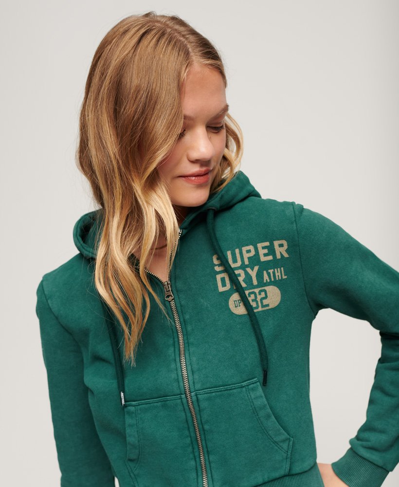 moletom cropped com zíper athletic essentials na cor verde pinho escuro