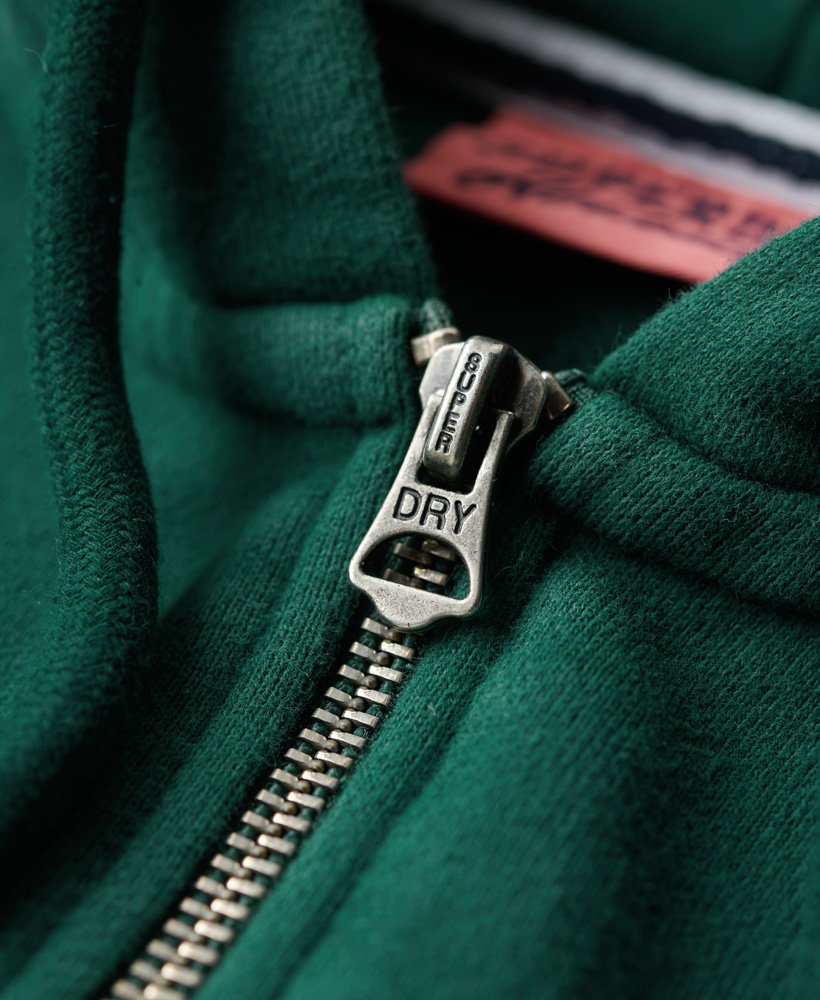 moletom cropped com zíper athletic essentials na cor verde pinho escuro