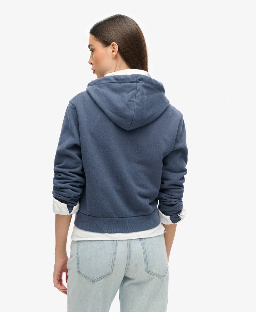 moletom cropped com zíper athletic essentials na cor azul atlético