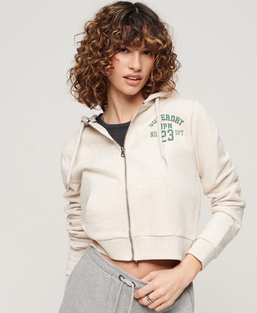moletom cropped com zíper athletic essentials na cor bege mesclado.