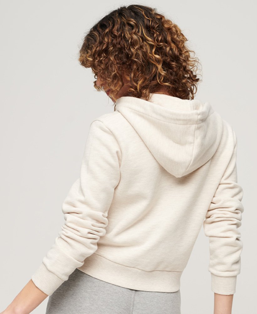 moletom cropped com zíper athletic essentials na cor bege mesclado.