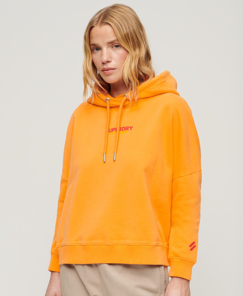 moletom boxy com logo esportivo na cor laranja vibrante.