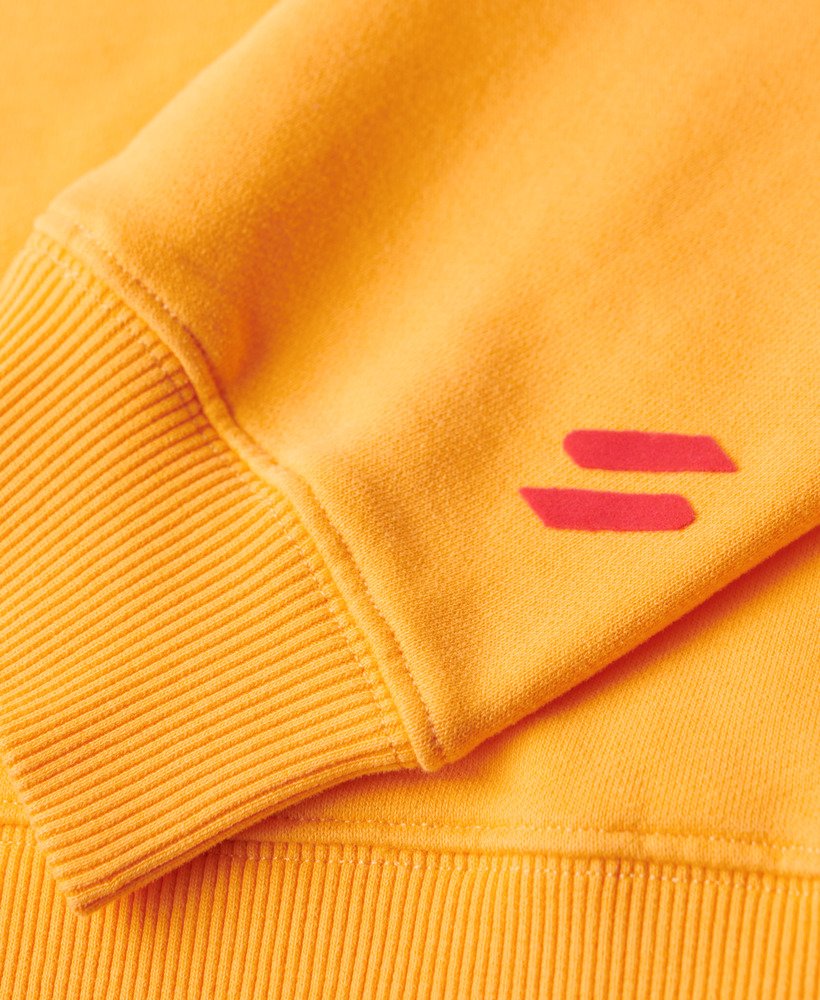 moletom boxy com logo esportivo na cor laranja vibrante.