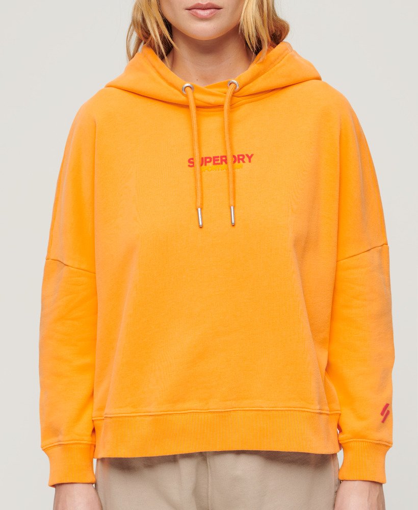 moletom boxy com logo esportivo na cor laranja vibrante.