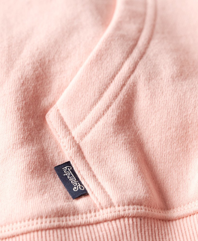 moletom com zíper e logo essencial na cor rosa claro