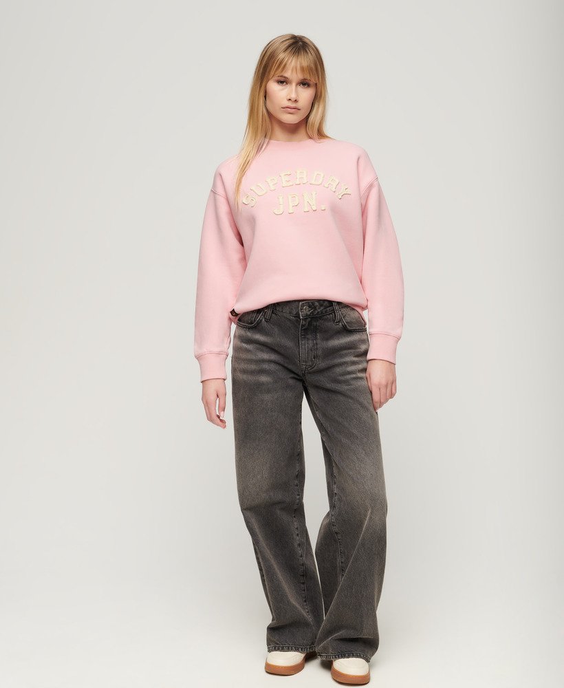 moletom folgado esportivo com apliques na cor rosa romance.