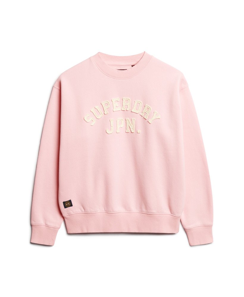 moletom folgado esportivo com apliques na cor rosa romance.