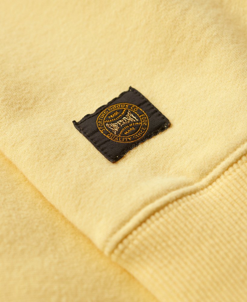 moletom esportivo folgado com apliques em amarelo claro