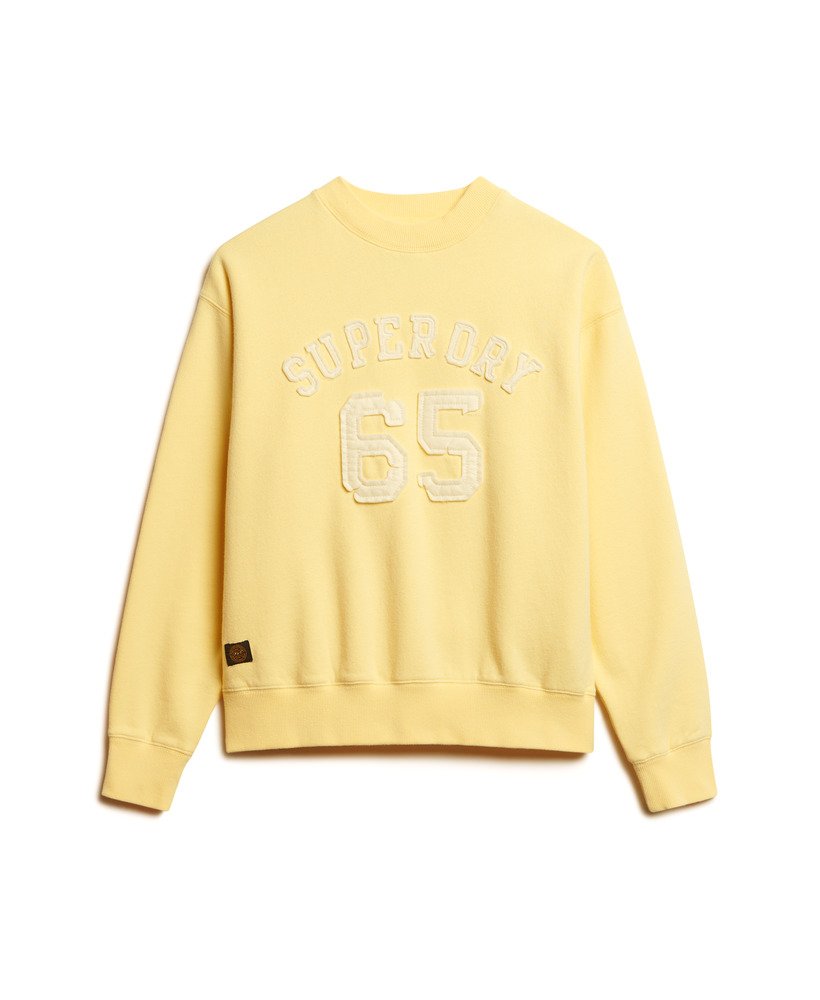 moletom esportivo folgado com apliques em amarelo claro