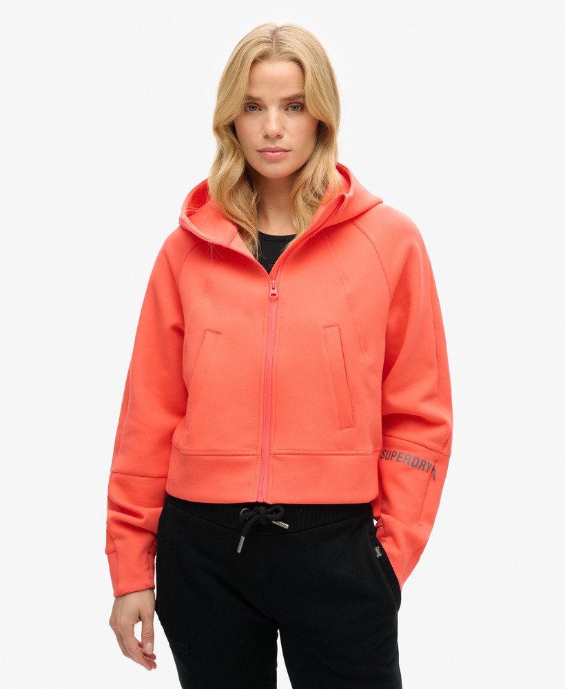moletom com zíper sport tech relaxed na cor coral vibrante