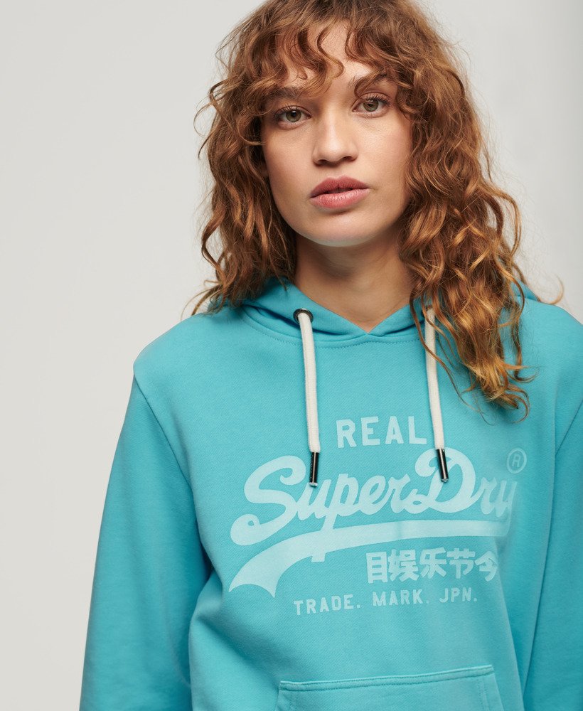 moletom com capuz estampado em neon na cor azul kingfisher