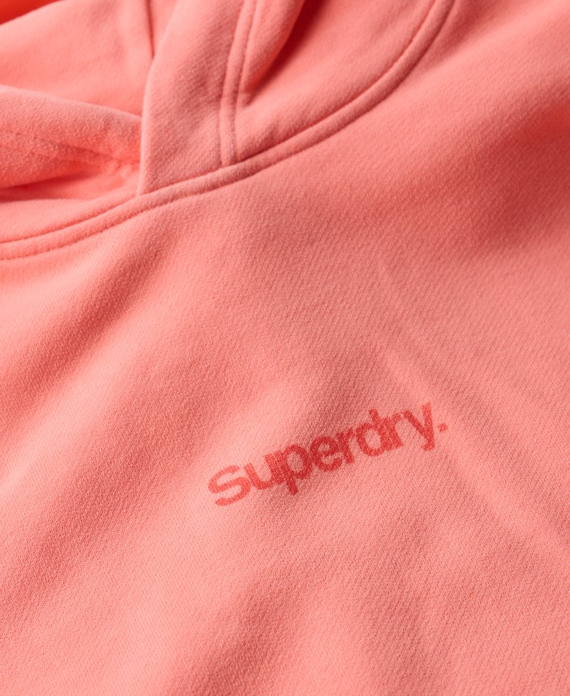 moletom folgado com capuz core logo city na cor coral pastel.