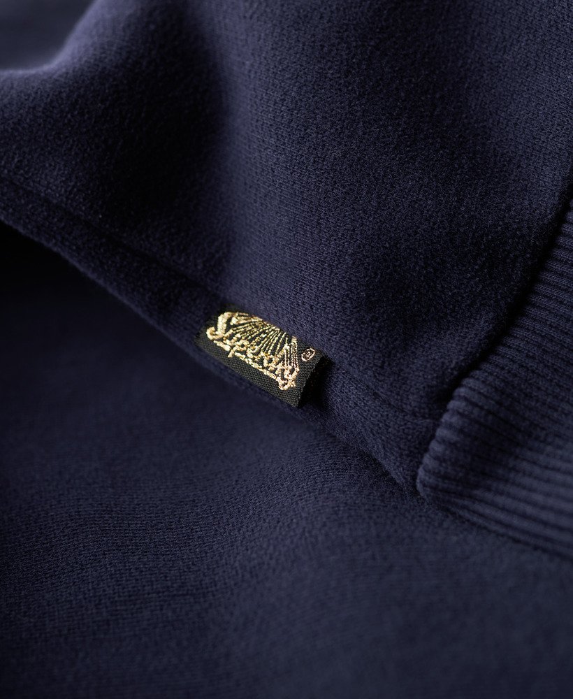 moletom com capuz e estampa do logo vintage de nova york na cor azul marinho intenso.
